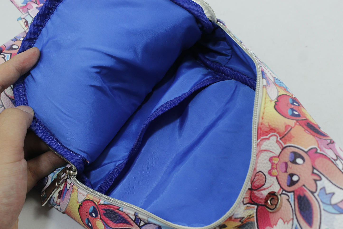Evolution + Love Monster Trainer Sling Bag