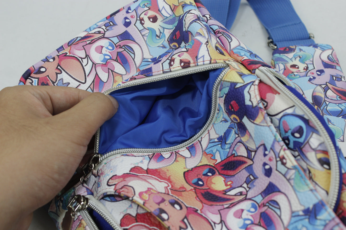 Evolution + Love Monster Trainer Sling Bag