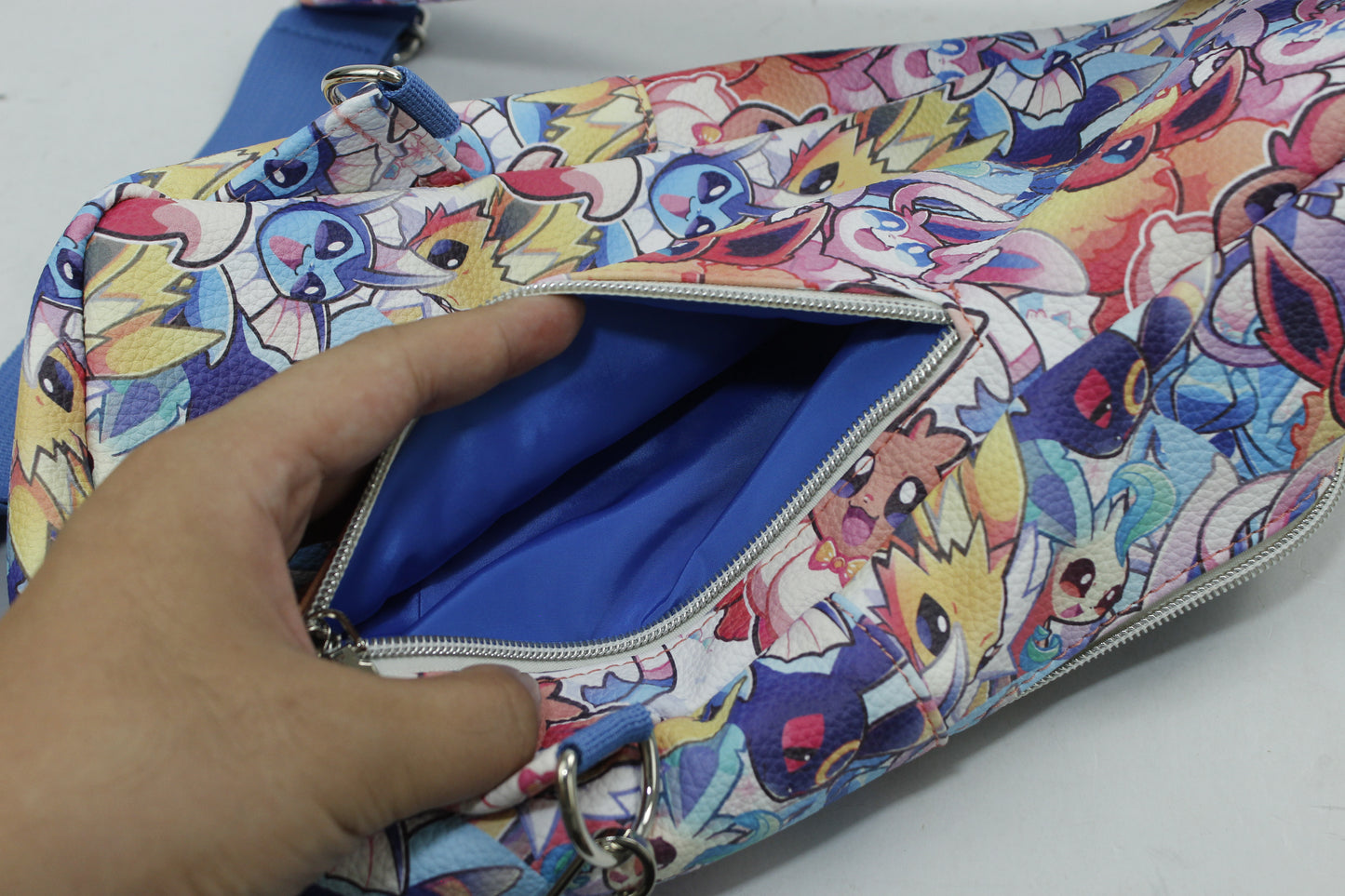 Evolution + Love Monster Trainer Sling Bag